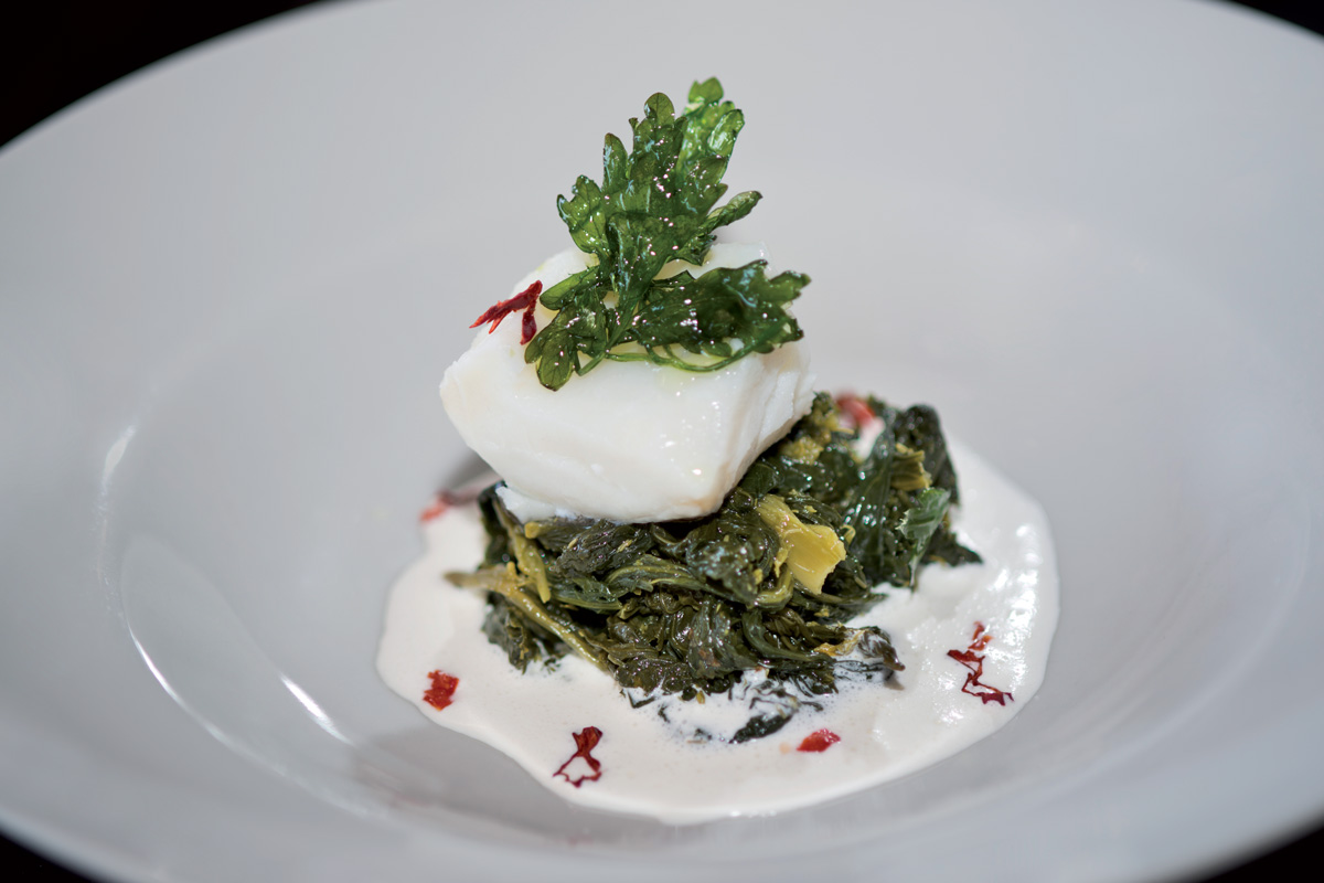 Cuore di baccalà on hedgehog of broccoli with parmesan fondue and chili peppers