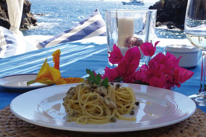 Spaghetti with “ischitan anchovies”, capers from pantelleria, crumbs of bread and lemon zest